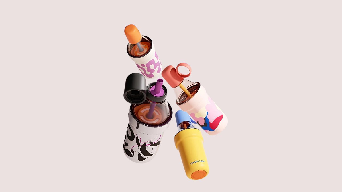 Colourful Chako Lab insulated tumblers and travel cups floating against a soft pink background