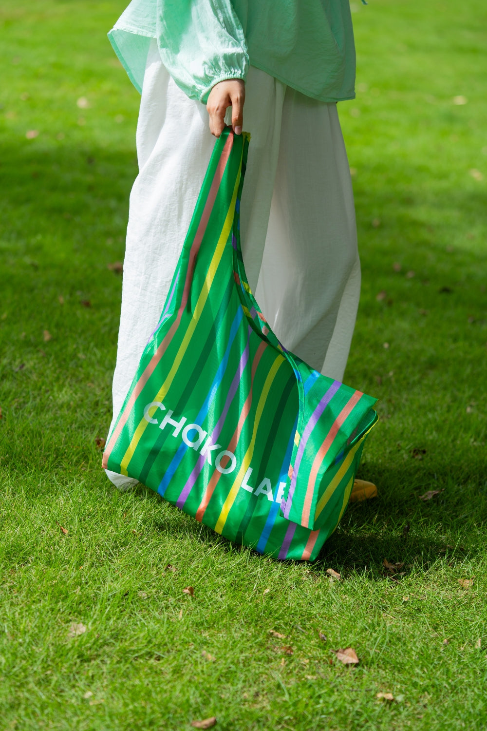 Chako Reusable Bag Fruit Market and Green Stripe in a field