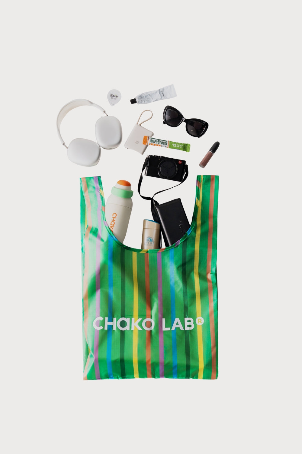 Chako Reusable Bag Green Stripe held with fruit